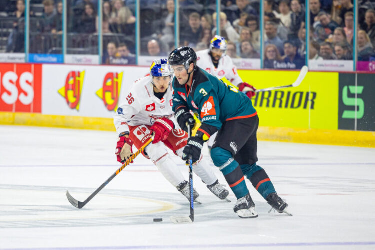 BELFAST,NORTHERN IRELAND,10.OCT.23 - ICE HOCKEY - CHL, Champions Hockey League, Belfast Giants vs EC Red Bull Salzburg. Image shows Peter Hochkofler (EC RBS) and Charlie Curti (Belfast). Photo: GEPA pictures/ Gintare Karpaviciute - For editorial use only. Image is free of charge.
