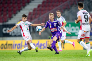KLAGENFURT,AUSTRIA,09.AUG.23 - SOCCER - ADMIRAL Bundesliga, SK Austria Klagenfurt vs Wolfsberger AC. Image shows Adis Jasic (WAC) and Christopher Cvetko (A.Klagenfurt). Photo: GEPA pictures/ Matic Klansek - For editorial use only. Image is free of charge.