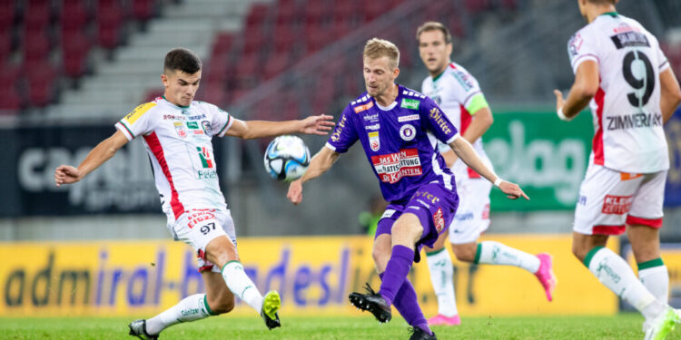 Knallstart in die Bundesliga-Saison: Kärntner Derby in Wolfsberg 1 KLAGENFURT,AUSTRIA,09.AUG.23 - SOCCER - ADMIRAL Bundesliga, SK Austria Klagenfurt vs Wolfsberger AC. Image shows Adis Jasic (WAC) and Christopher Cvetko (A.Klagenfurt). Photo: GEPA pictures/ Matic Klansek - For editorial use only. Image is free of charge.