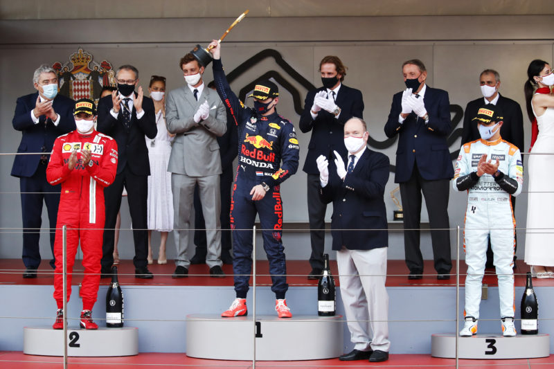 MONTE-CARLO, MONACO - MAY 23: Race winner Max Verstappen of Netherlands and Red Bull Racing, second placed Carlos Sainz of Spain and Ferrari third placed Lando Norris of Great Britain and McLaren F1 celebrate on the podium during the F1 Grand Prix of Monaco at Circuit de Monaco on May 23, 2021 in Monte-Carlo, Monaco. (Photo by Gonzalo Fuentes - Pool/Getty Images) // Getty Images / Red Bull Content Pool // SI202105230424 // Usage for editorial use only //