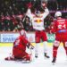 KLAGENFURT,AUSTRIA,31.MAR.23 - ICE HOCKEY - ICE Hockey League, play off semifinal, Klagenfurter AC vs EC Red Bull Salzburg. Image shows Sebastian Dahm, Steven Strong (KAC) and the rejoicing of Peter Hochkofler (EC RBS). Photo: GEPA pictures/ Daniel Goetzhaber - For editorial use only. Image is free of charge.